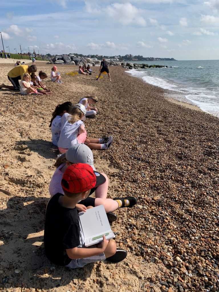 photo of pupils learning on the beach at Felixstowe the
